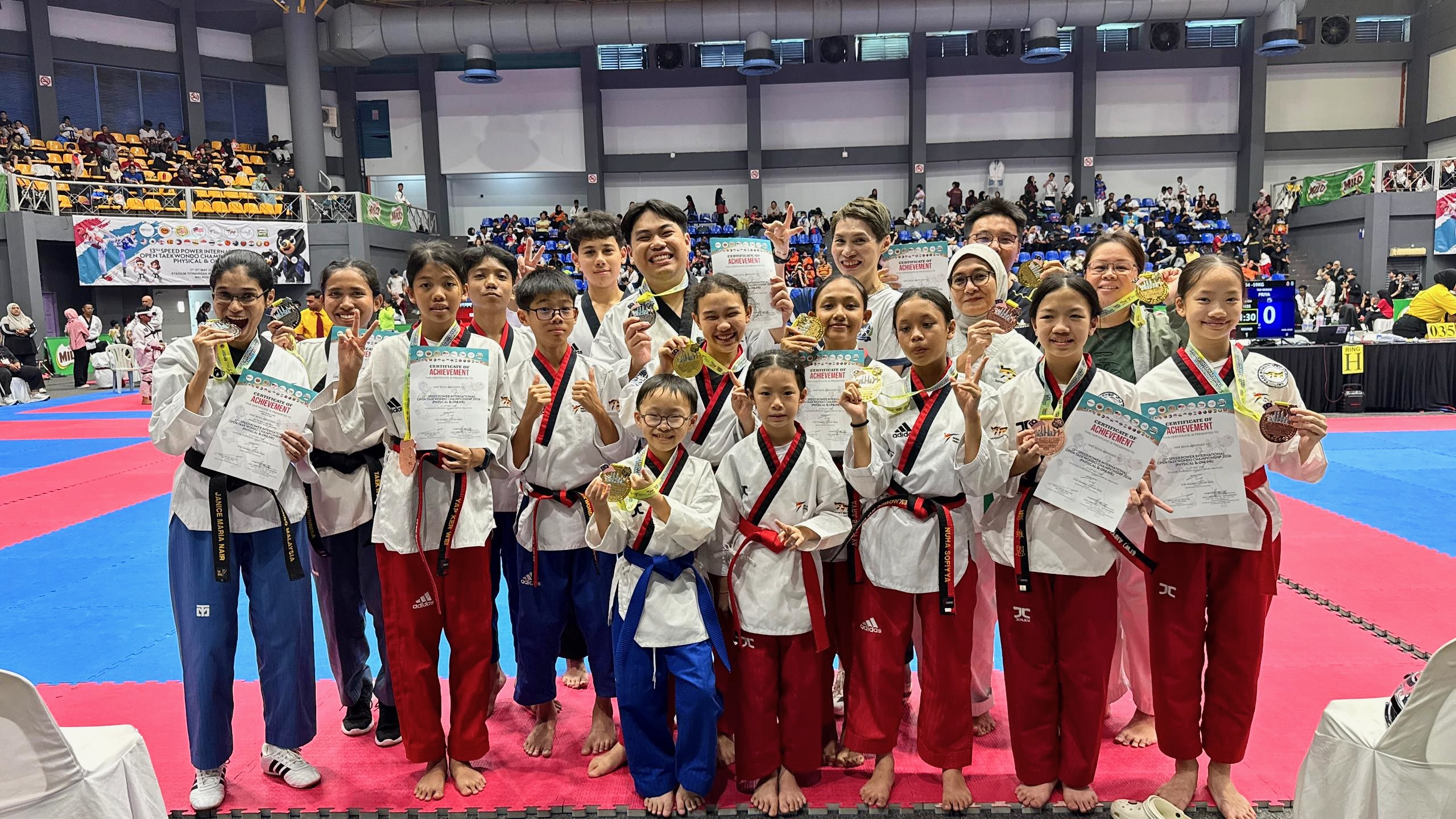 Power Sport team with medals and certificates at a championship