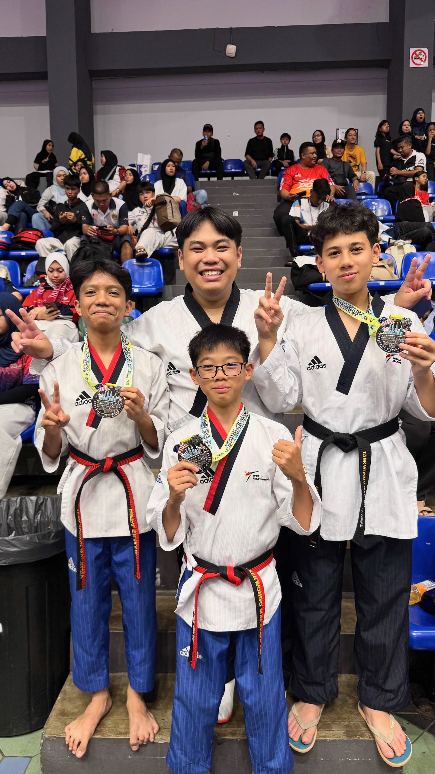 Power Sport students with medals at a competition