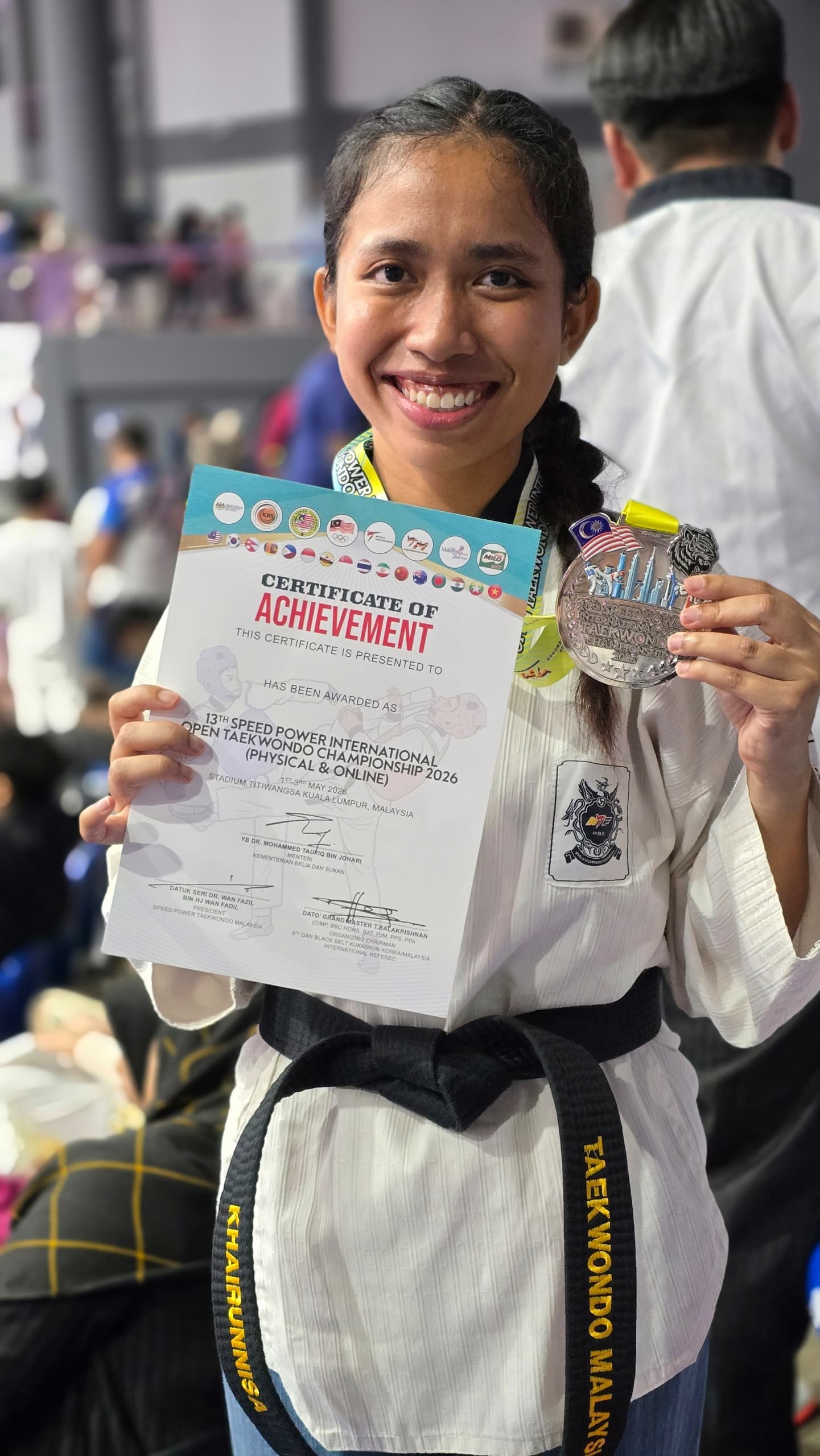 Power Sport student with a certificate of achievement
