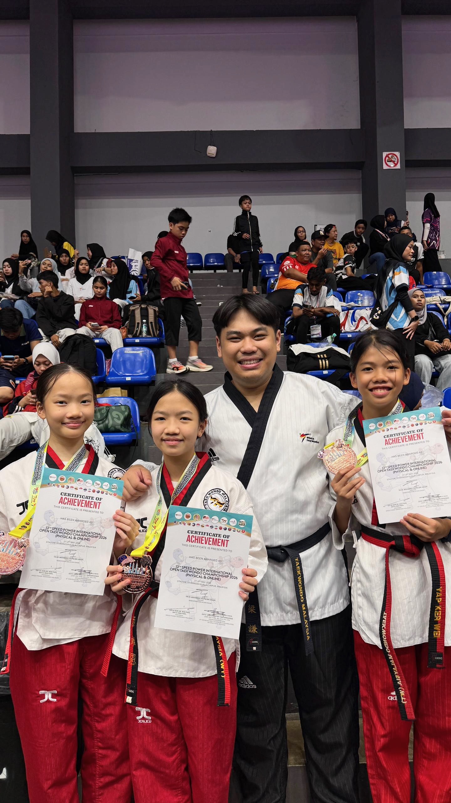 Power Sport students with certificates of achievement