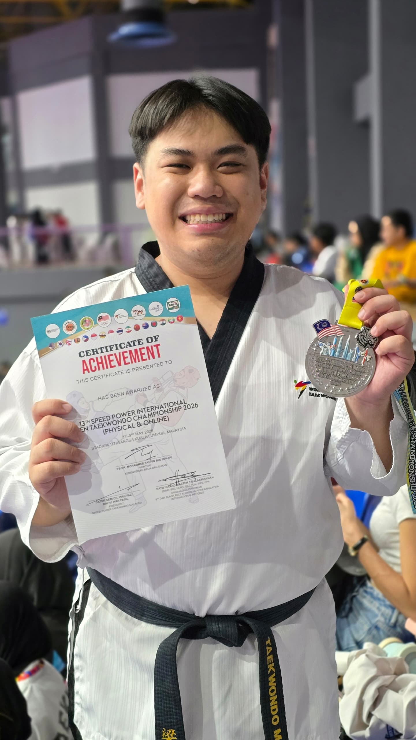 Power Sport coach with a certificate and medal