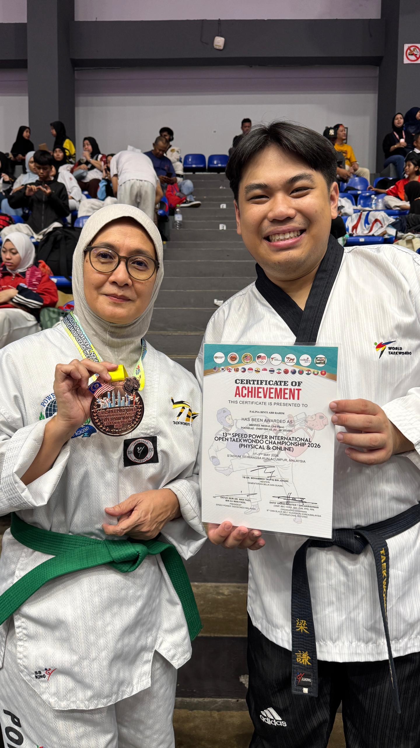 Power Sport coach and student with a certificate