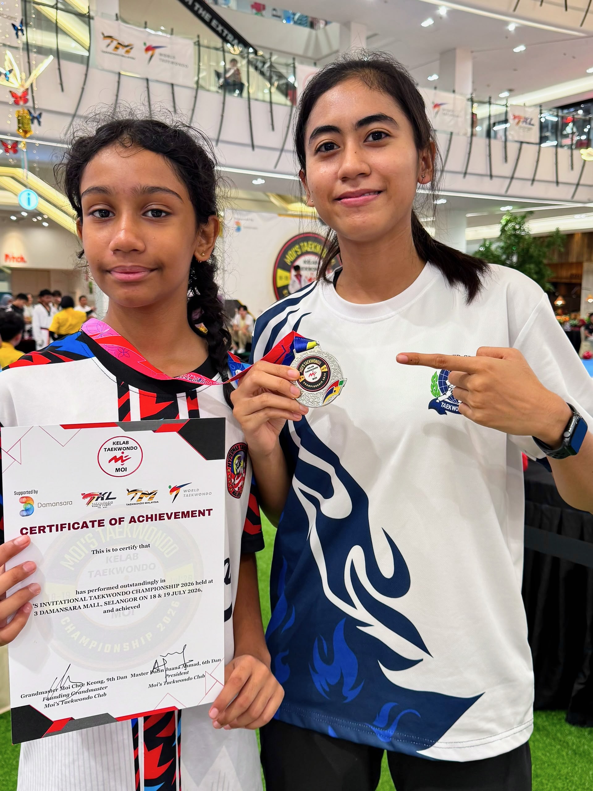 Power Sport student with a certificate and medal