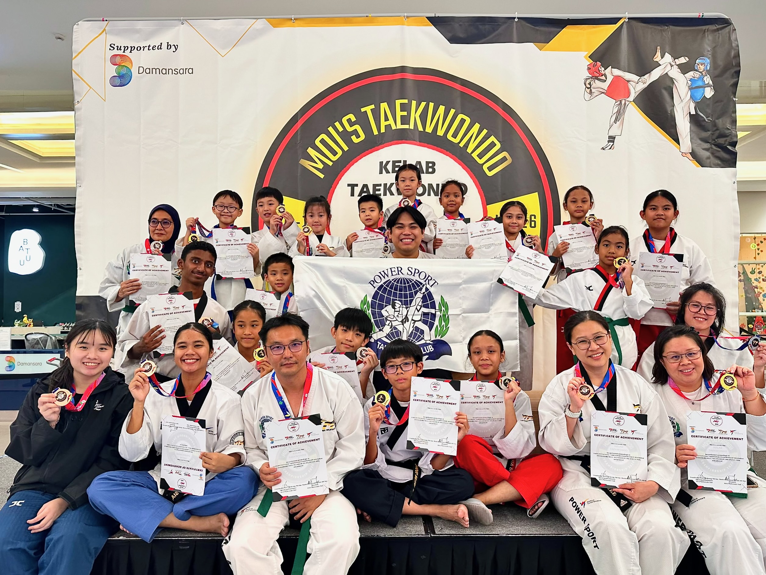 Power Sport students and coaches with medals at a competition