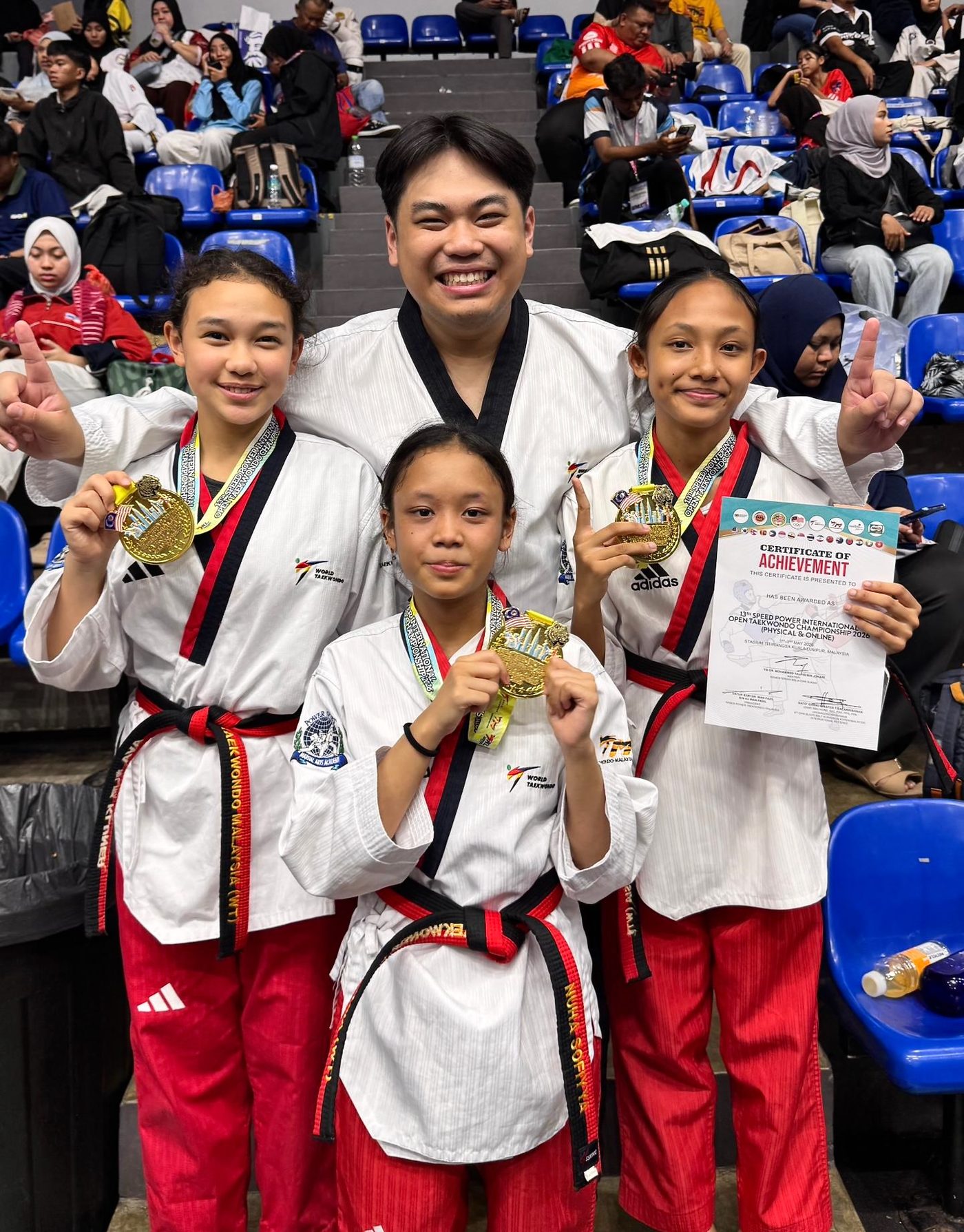 Power Sport students with gold medals at an international Taekwondo championship